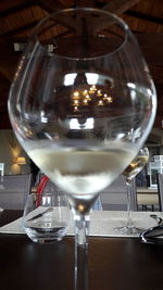 Close-up of wine glass on table in restaurant