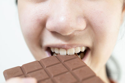 Close-up of boy eating ice cream