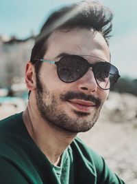 Portrait of young man wearing sunglasses