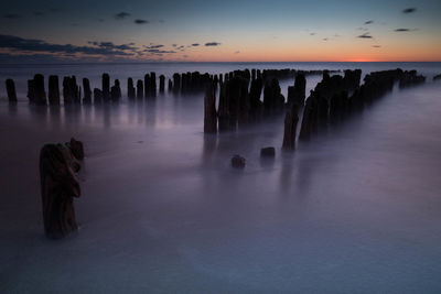 Panoramic view of silhouette trees against sky during sunset