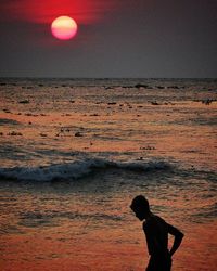 Scenic view of sea at sunset