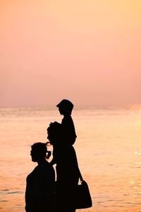 Scenic view of sea at sunset