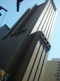 Low angle view of modern building against sky