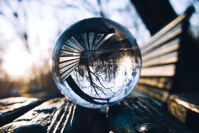 Close-up of crystal ball on metal