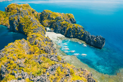 High angle view of rock formation in sea