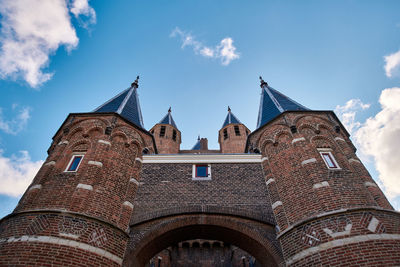 Haarlem attraction, amsterdamse poort city gates, netherlands. low angle view.