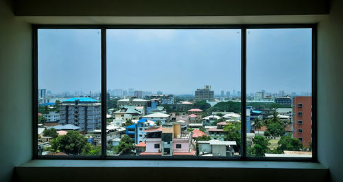 Buildings seen through window