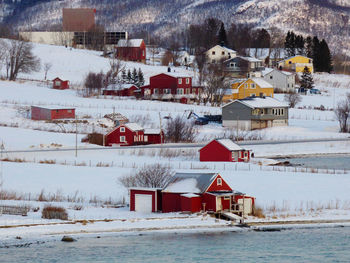 House on snow covered landscape