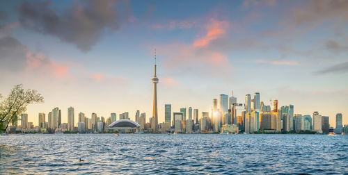 View of buildings against cloudy sky