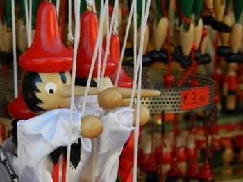 Close-up of multi colored pencils for sale at market stall