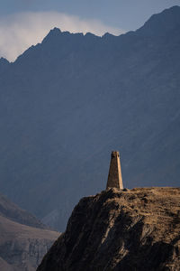 Built structure against mountain range