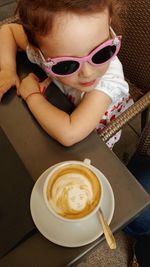 High angle view of coffee cup on table