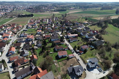 High angle view of houses on field