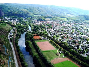 High angle view of farms against sky