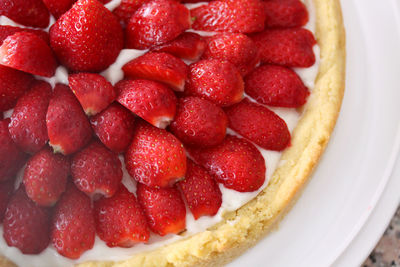 Directly above view of strawberries tart