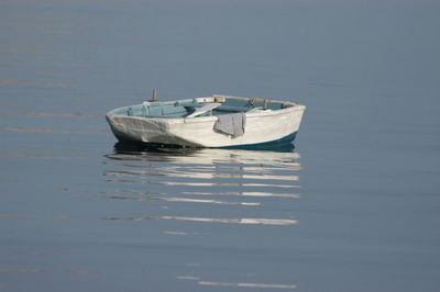 Boat moored in water
