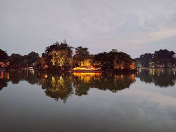 Scenic view of lake against sky during sunset