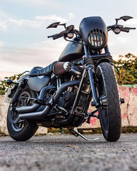 Close-up of motorcycle on street