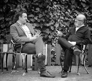 Men sitting in park