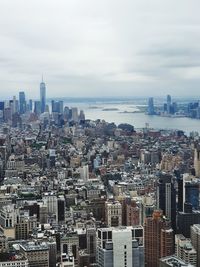 Aerial view of cityscape against sky