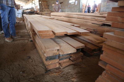 Low section of man working on wood