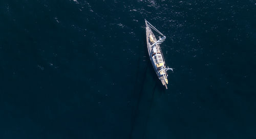 Aerial drone view of a yacht boat on ocean