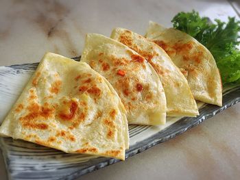 Close-up of served food on table