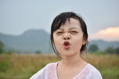 Portrait of girl making face