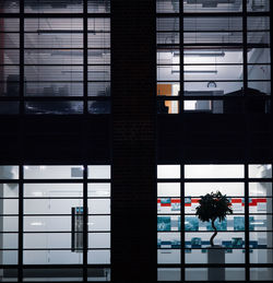 Reflection of building on glass window