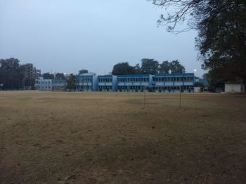 Built structure on field against clear sky