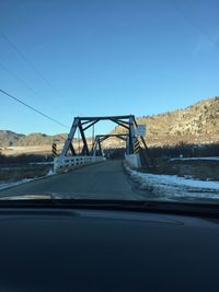 View of bridge against clear blue sky