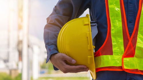 Midsection of man working at construction site