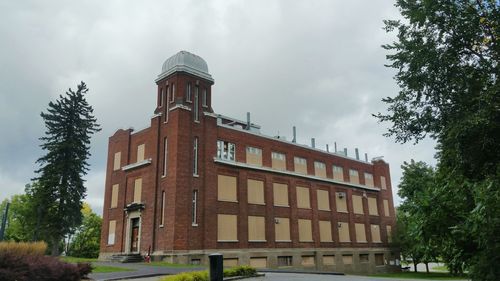 View of building against cloudy sky