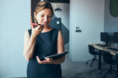 Young woman using mobile phone