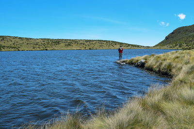 Fishing at lake ellis, chogoria route, mount kenya national park, kenya