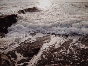 Waves splashing on rocks