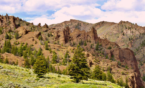 Scenic view of rocky mountains against sky