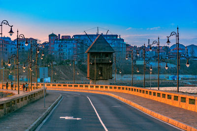 View of city street against blue sky, nesebar