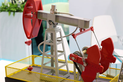 Close-up of red umbrella on table