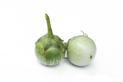 Close-up of fruits against white background