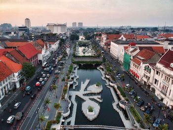 High angle view of street amidst buildings in city