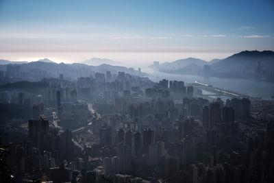 High angle view of buildings in city against sky