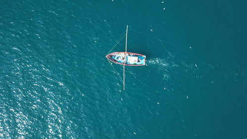 High angle view of sailboat in sea