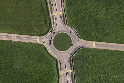 Aerial view of traffic circle on sunny day