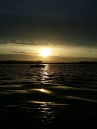 Scenic view of sea at sunset