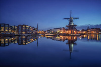 Reflection of illuminated buildings in water