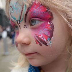 Close-up of girl with face paint