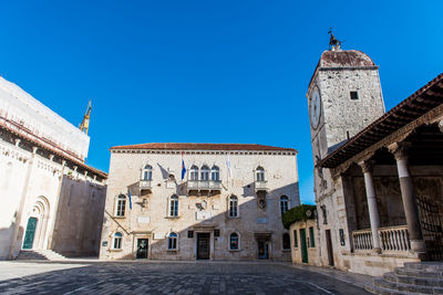 View of historic building against blue sky