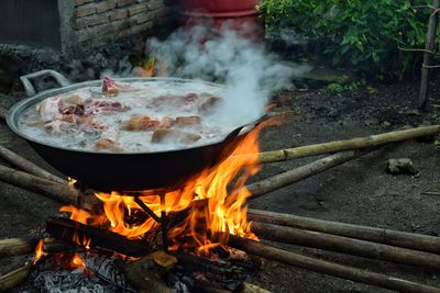 High angle view of bonfire on barbecue grill