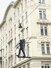 Low angle view of statue in city
